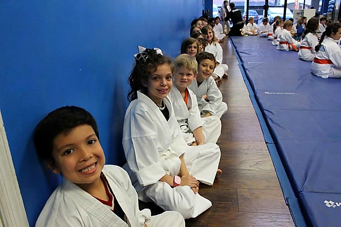 Young Taekwondo students lined up in class