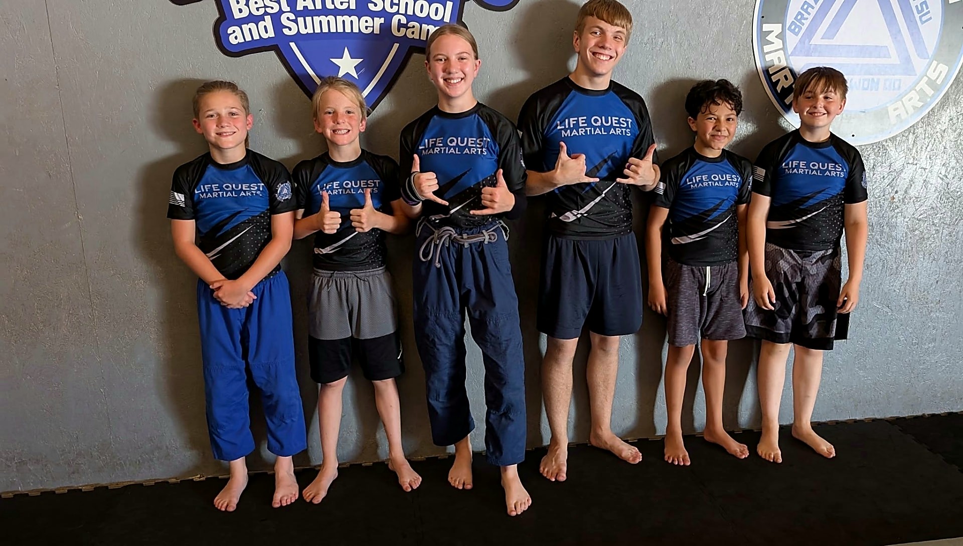 Life Quest youth team in team rash guards